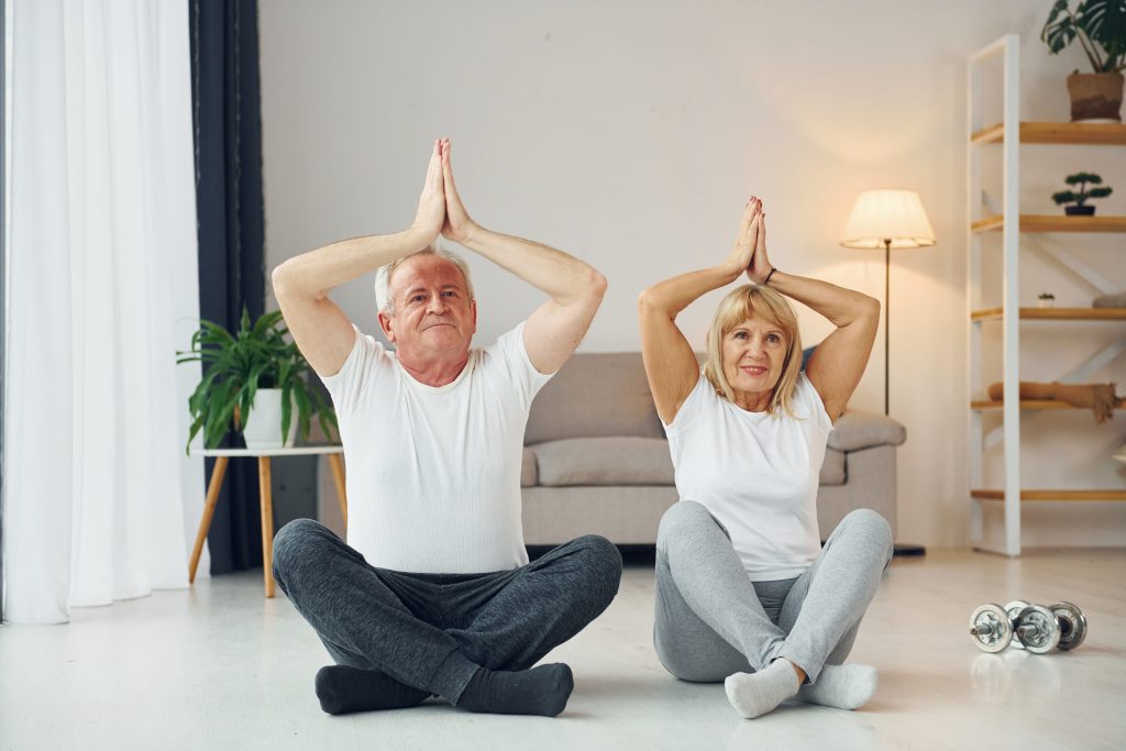 doing-yoga-senior-man-and-woman-is-together
