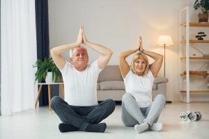 doing-yoga-senior-man-and-woman-is-together